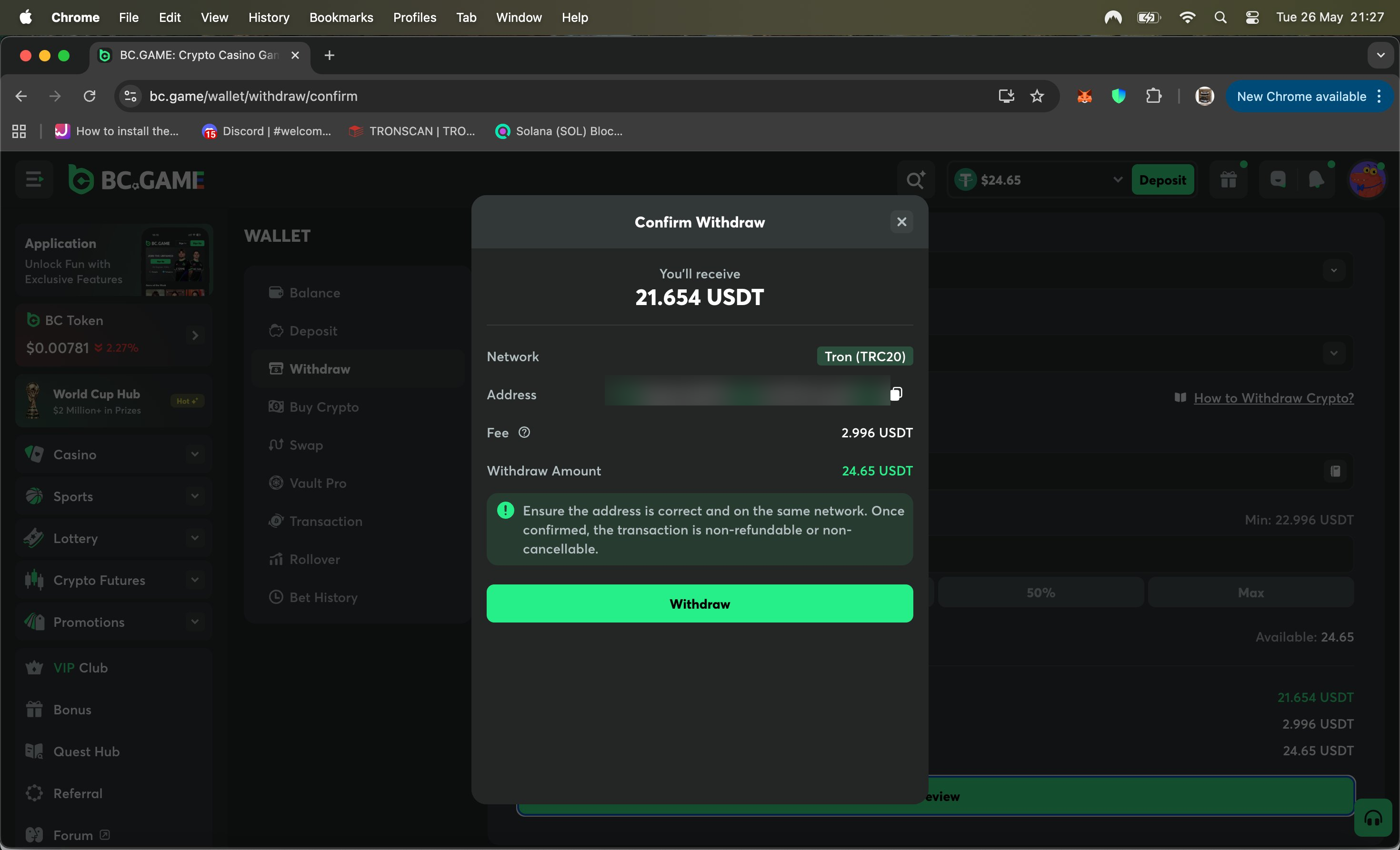 BC.Game Confirm Withdraw screen showing a 2.996 USDT fee on a 24.65 USDT withdrawal, Tron TRC20 network